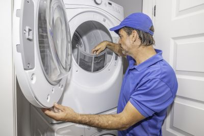Dryer Repair Technician Working